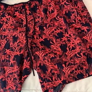 Coolibar red & black swim trunks. Mens medium
